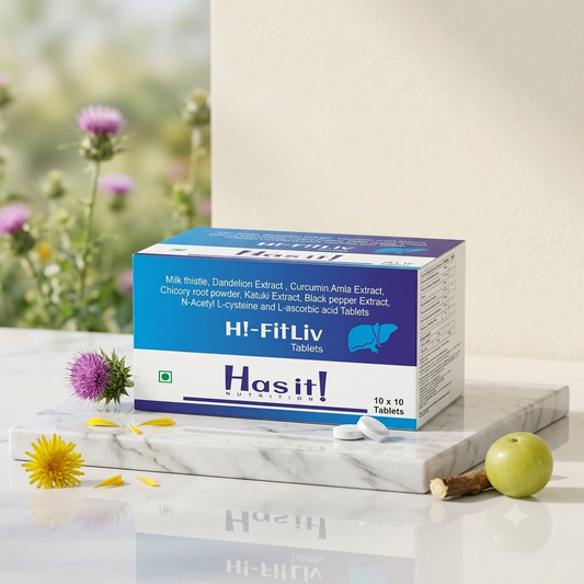 Hasit! HI-FitLiv Tablets box displayed on a marble tray with flowers, a green apple, and tablets in a bright, clean setting.