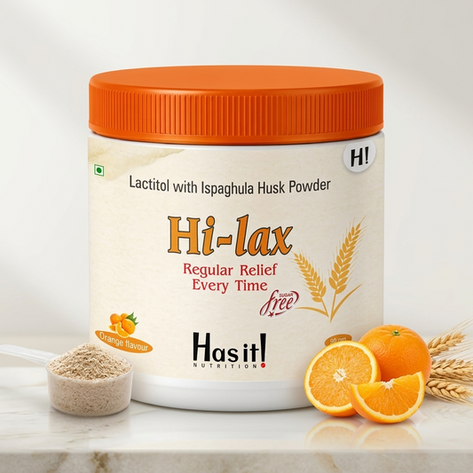 A white plastic jar of Has it! Nutrition Hi-lax Lactitol with Ispaghula Husk Powder in orange flavor, featuring an orange lid and a small scoop of powder beside it, with orange slices and wheat stalks on a light marble surface.